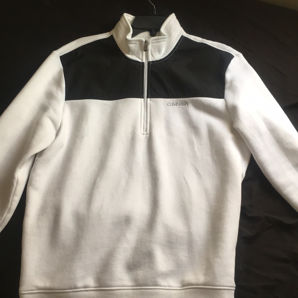 White Calvin Klein long sleeve sweater .